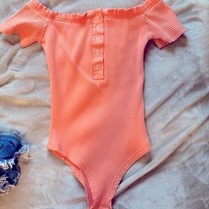 Pink off the shoulder bodysuit